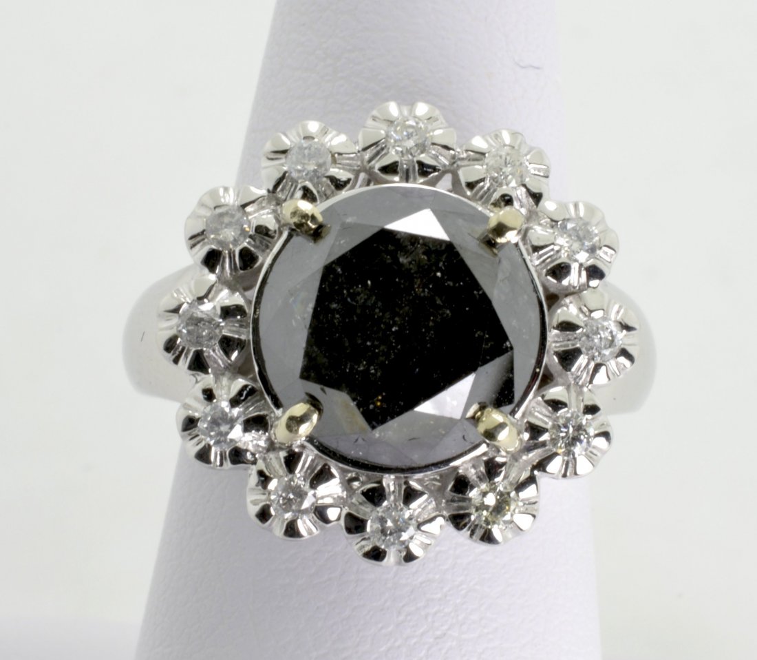 Black and White Diamond Ring AV: $11,200: 14K white gold ring with 7.23 ct of black and white diamonds