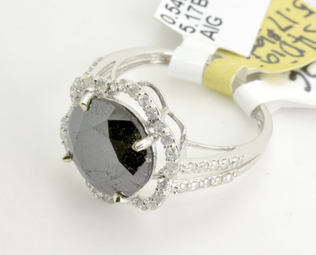 Black and White Diamond Ring AV: $9,200: 14K white gold ring with 5.71 ct of black and white diamonds