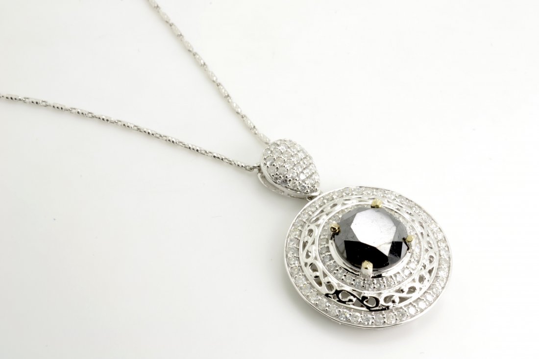 Black and White Diamond Necklace AV: $14,635: 14K white gold necklace with 7.18 ct of black and white diamonds