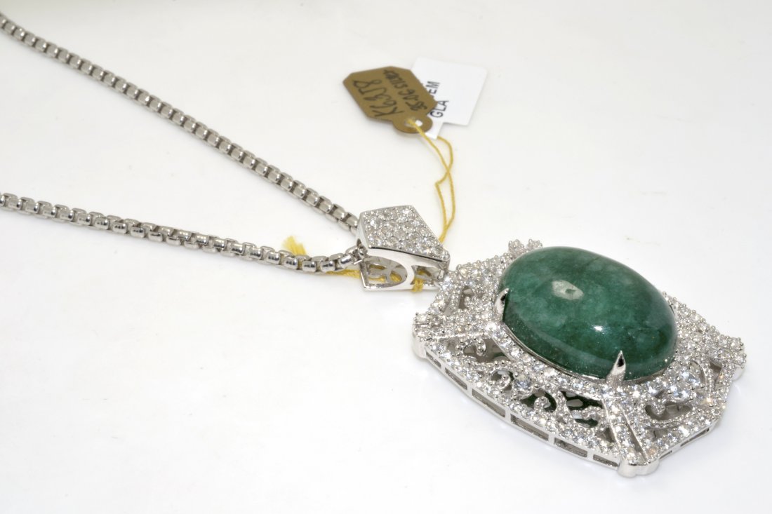 Emerald & Sapphire Necklace Appraised Value: $11,388: Solid platinum plated over silver necklace with 34.44 ct of enhanced emerald(beryl) and sapphires K63J8
