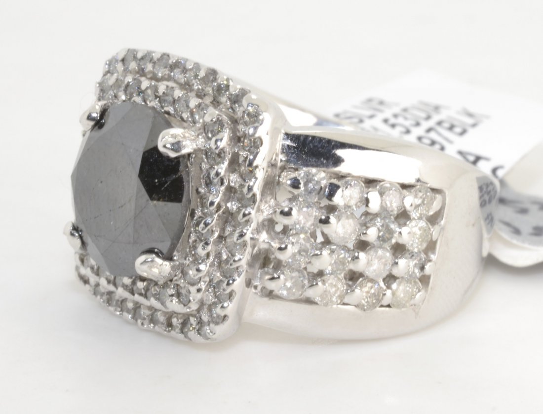 Black & White Diamond Ring Appraised Value: $25,442: 14K overlay ring with 1 black diamond and 96 genuine diamonds, 5.46 ct of black and white diamonds K15E65