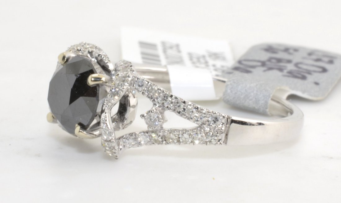 Black & White Diamond Ring Appraised Value: $7,621: 18K white gold ring with 1.83 ct of black and white diamonds K13E92