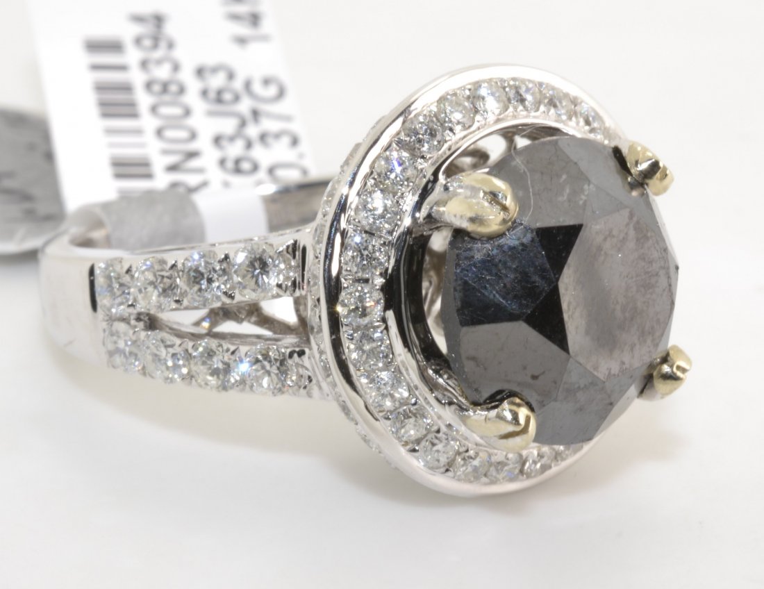 Black & White Diamond Ring Appraised Value: $15,725: 14K white gold ring with 10.27 ct of black and white diamonds *8.60 ct CENTER DIAMOND* K63J63