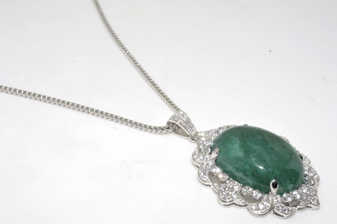 Emerald & Sapphire Necklace AV: $9,258: Solid platinum plated over silver necklace with 31.72 ct of enhanced emerald(BERYL) and colorless sapphires K45J2