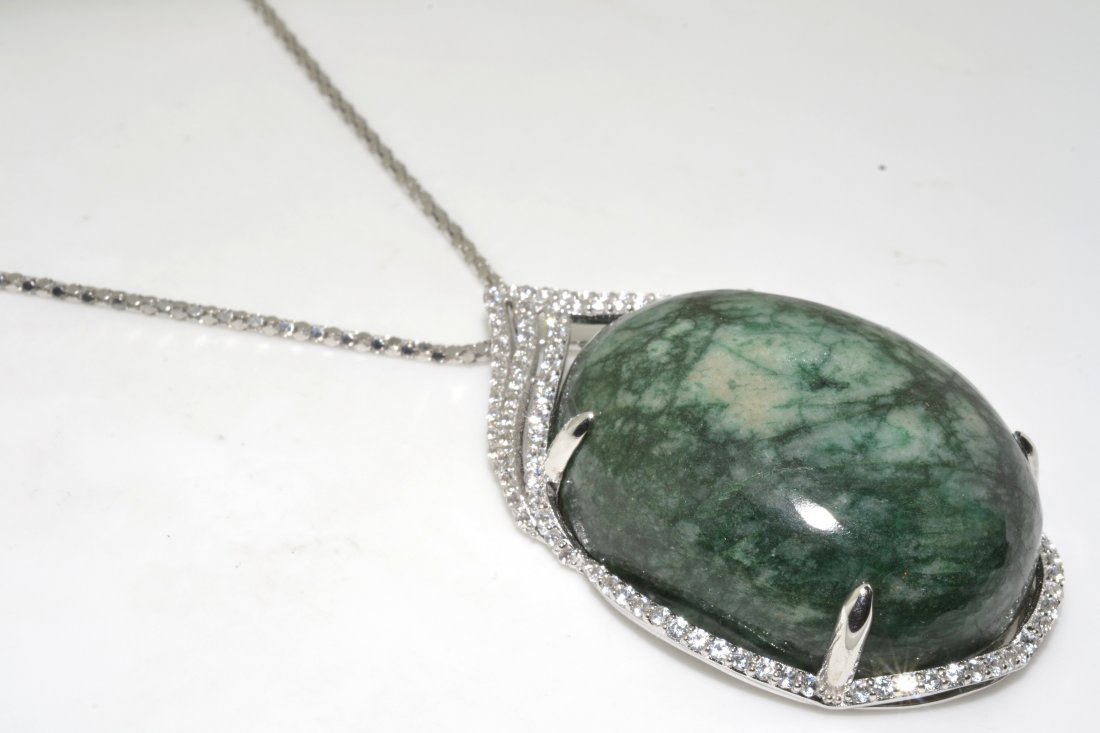 Emerald & Sapphire Necklace AV: $23,402: Solid platinum plated over silver necklace with 182.62 ct of enhanced green emerald(BERYL) and colorless sapphires K63J9