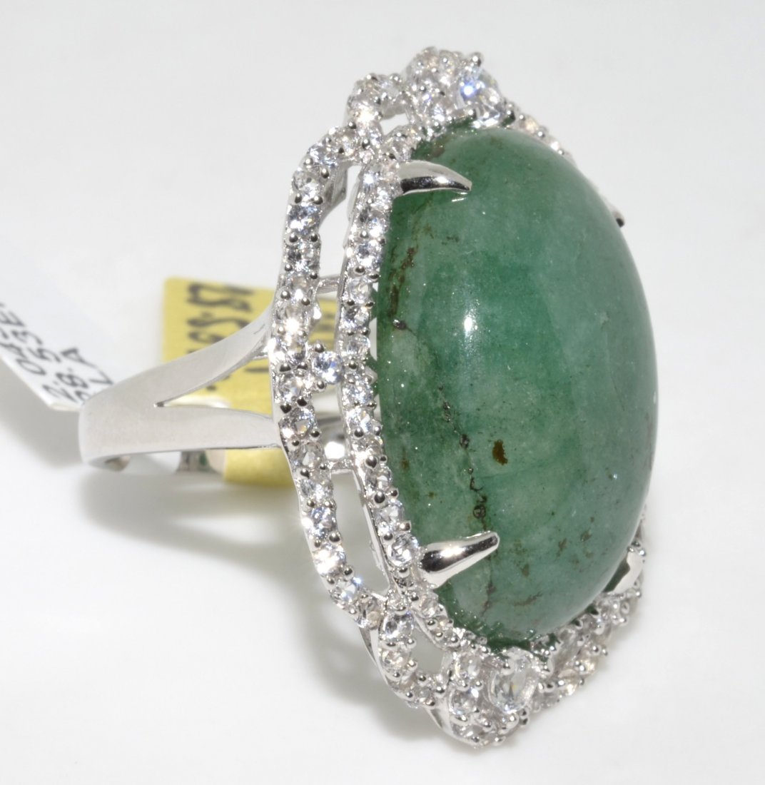 Emerald & Sapphire Ring Appraised Value: $8,928: Solid platinum plated over silver ring with 30.57 ct of emerald(BERYL) and colorless sapphires K35J8