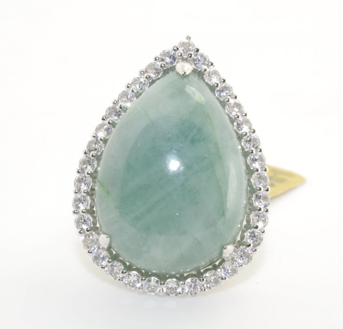Green Beryl and White Sapphire Ring AV: $970.00: 925 silver ladies cast ring with a 26.59 ct green beryl center stone and 1.43 ct of sapphire K22J5