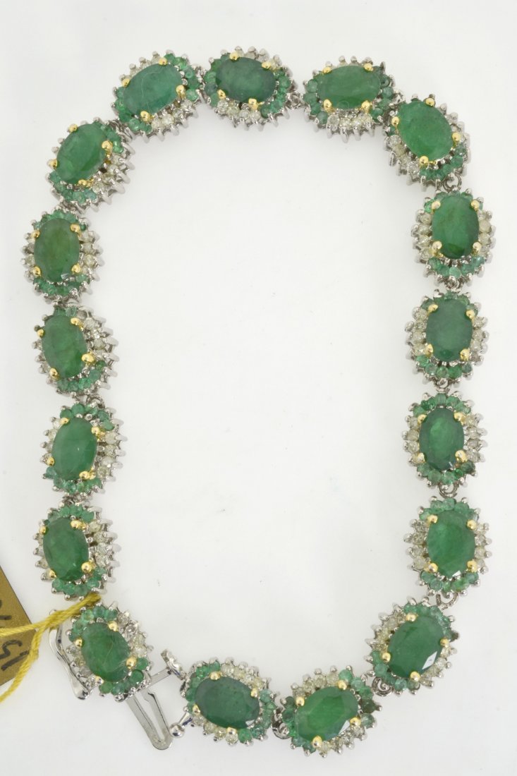 Emerald (Beryl) & Diamond Bracelet AV: $16,945: Solid silver bracelet with solid 18K yellow gold prongs mounted with 15.30 ct of emerald (beryl) and 1.58 ct of genuine diamonds! K24E17