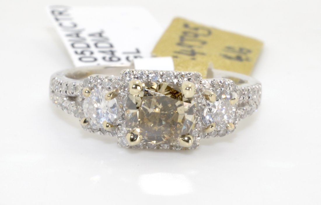 Fancy Dark Brown Diamond & White Diamond Ring (EGL CERT: 14K white gold ring with yellow gold 1.69 ct of diamonds **1.02 ct diamond fancy brown diamond center stone** The ring also contains 68 round brilliant cut natural diamonds that are F-G in color and S