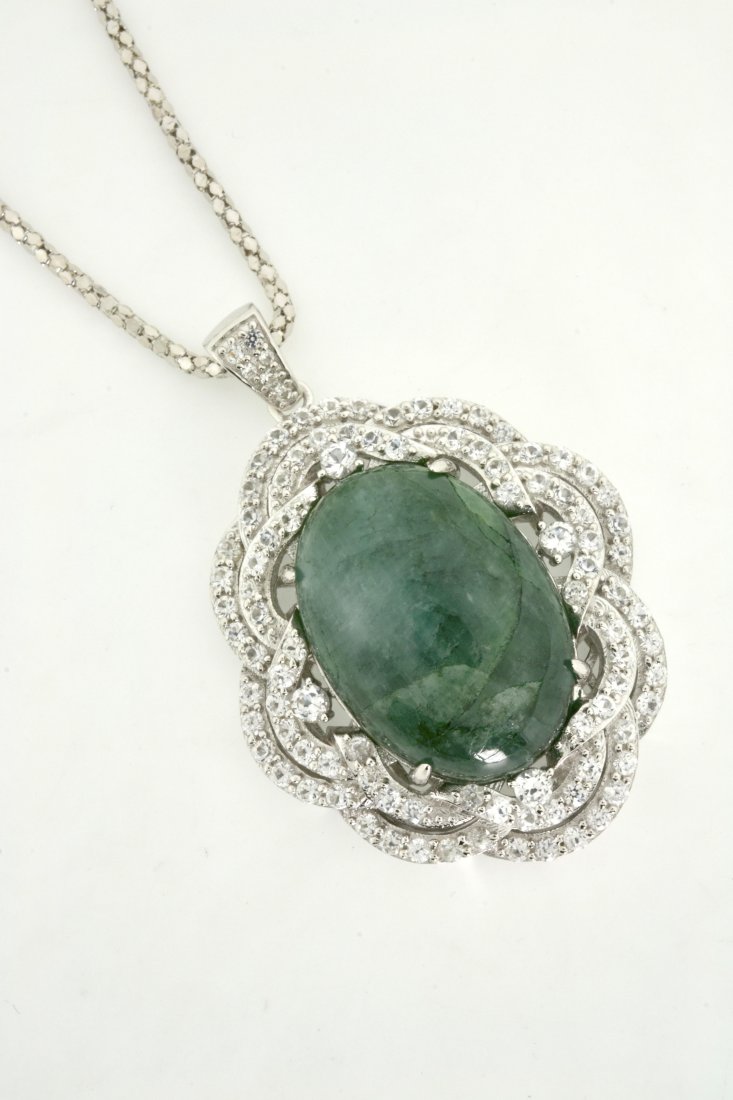 Green Beryl & Sapphire Necklace Appraised Value: $8,461: Solid platinum plated over silver necklace with a 30.56 ct green beryl center stone and 3.80 ct of sapphires K47J7