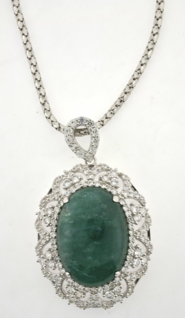 Emerald & Sapphire Necklace AV: $9,152: Solid platinum plated over silver necklace with 4.39 ct of colorless sapphires and 29.14 ct enhanced emerald (BERYL) center stone K44J9