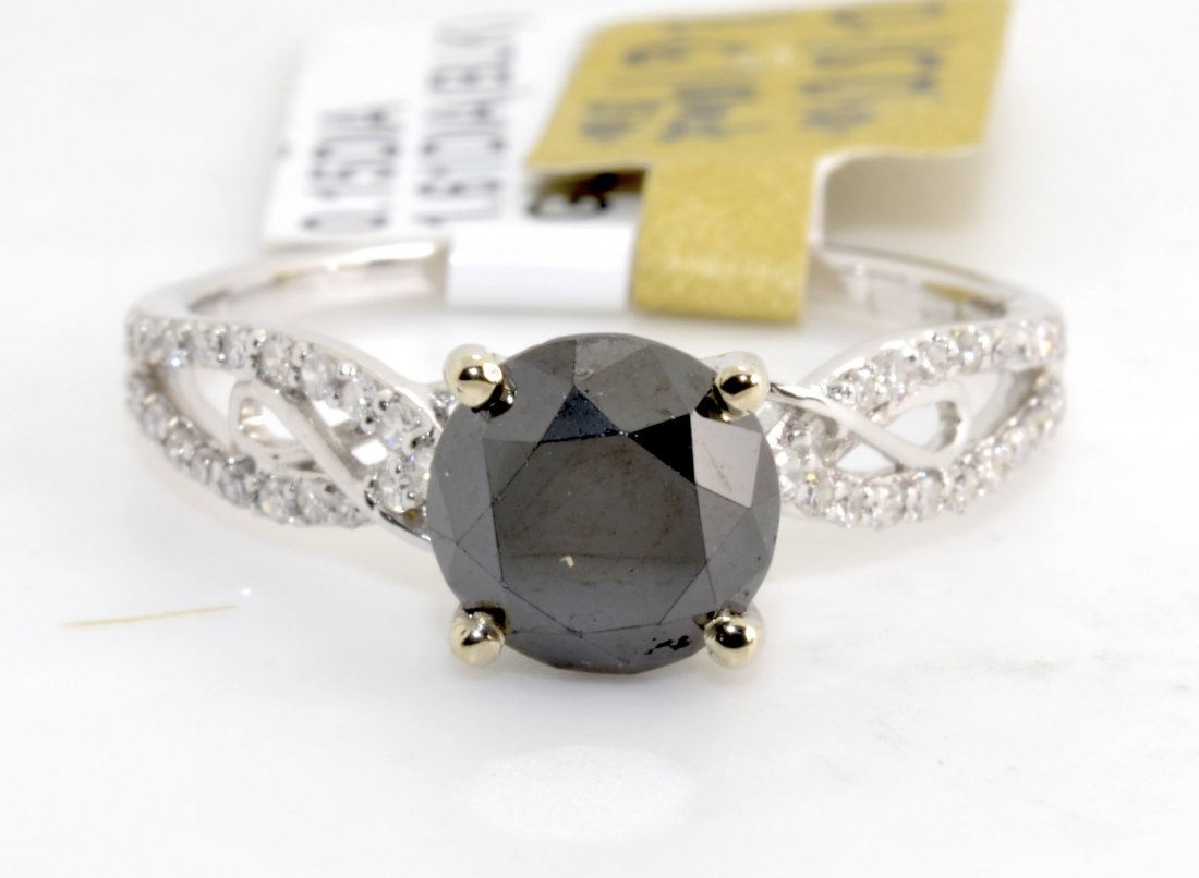 Black & White Diamond Ring AV: $4,087: 18K white gold ring with 0.15 ct of diamonds and 1.61 ct black diamond center stone K98J1