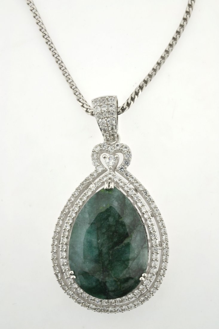 Emerald & Sapphire Necklace Appraised Value: $6,772: Solid platinum plated over silver necklace with 29.64 ct enhanced emerald/beryl (CENTER STONE) and 3.48 ct of colorless sapphires K44J9