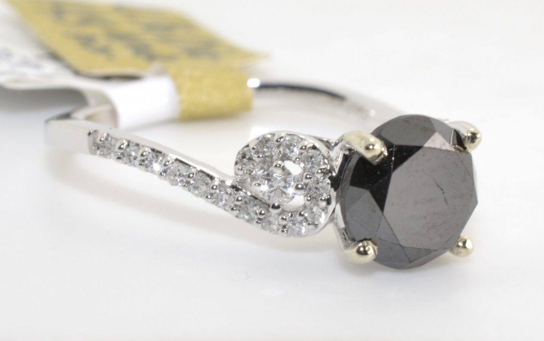 Black & White Diamond Ring Appraised Value: $3,737: 18K white gold ring with 1.43 ct black diamond (CENTER DIAMOND) and 0.16 ct of diamonds K95J1