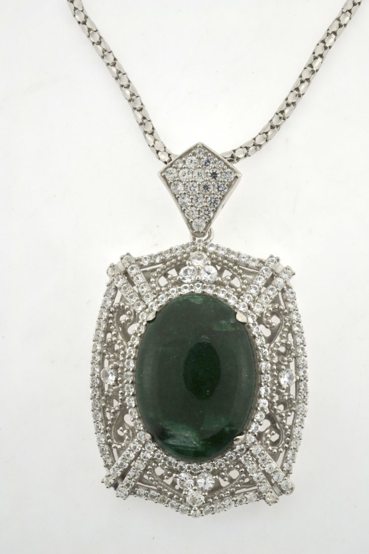 Emerald & Sapphire Necklace Appraised Value: $9,548: Solid platinum plated over silver necklace with 28.41 ct of enhanced emerald/beryl and 4.88 ct of colorless sapphires K49J3