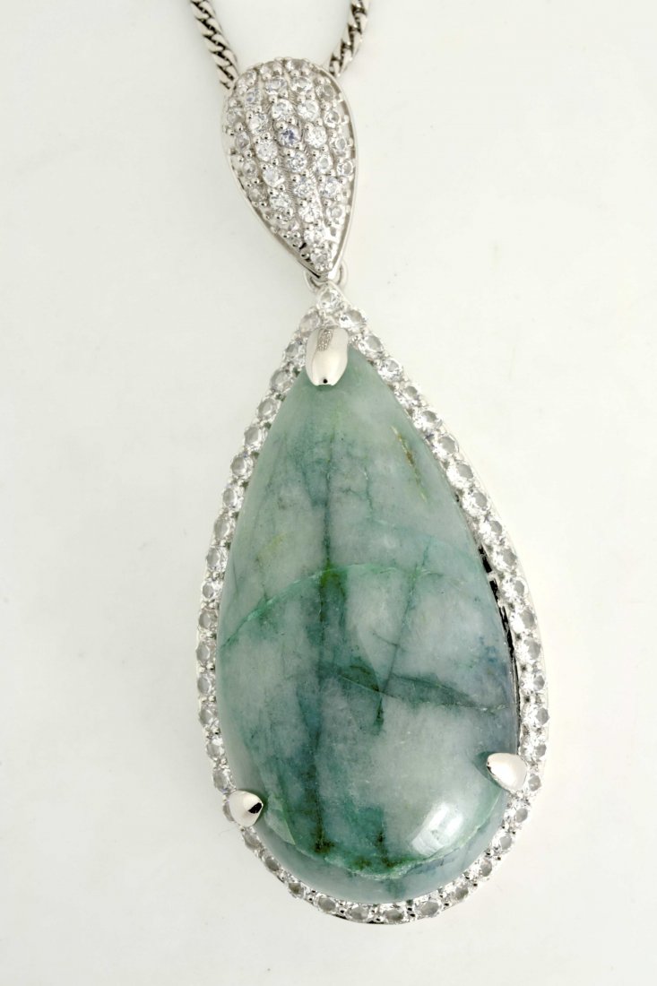 Enhanced Emerald & Sapphire Necklace AV: $10,686: Solid platinum plated over silver necklace with a 97.51 ct enhanced emerald (beryl) and 5.24 cts of excellent quality colorless sapphires K46J9