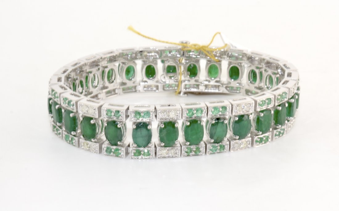 Emerald & Diamond Bracelet AV: $18,882: Solid rhodium plated over silver bracelet with 22.28 cts of genuine emerald (beryl) and 1.08 cts of genuine diamonds K19J95