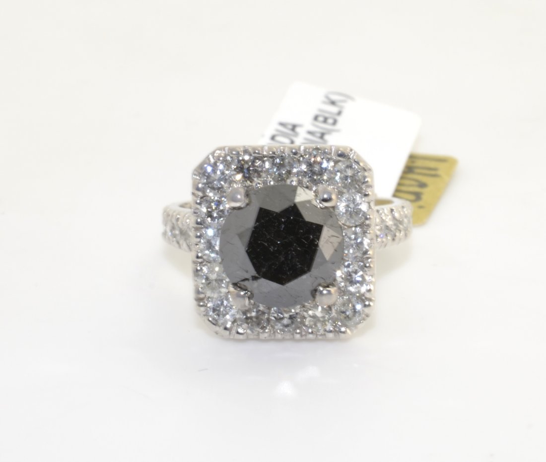 Black & White Diamond Ring AV: $6,150: 14K white gold ladies ring with a 3.81 CARAT BLACK DIAMOND CENTER STONE and 1.40 CARATS OF WHITE DIAMONDS K35J95