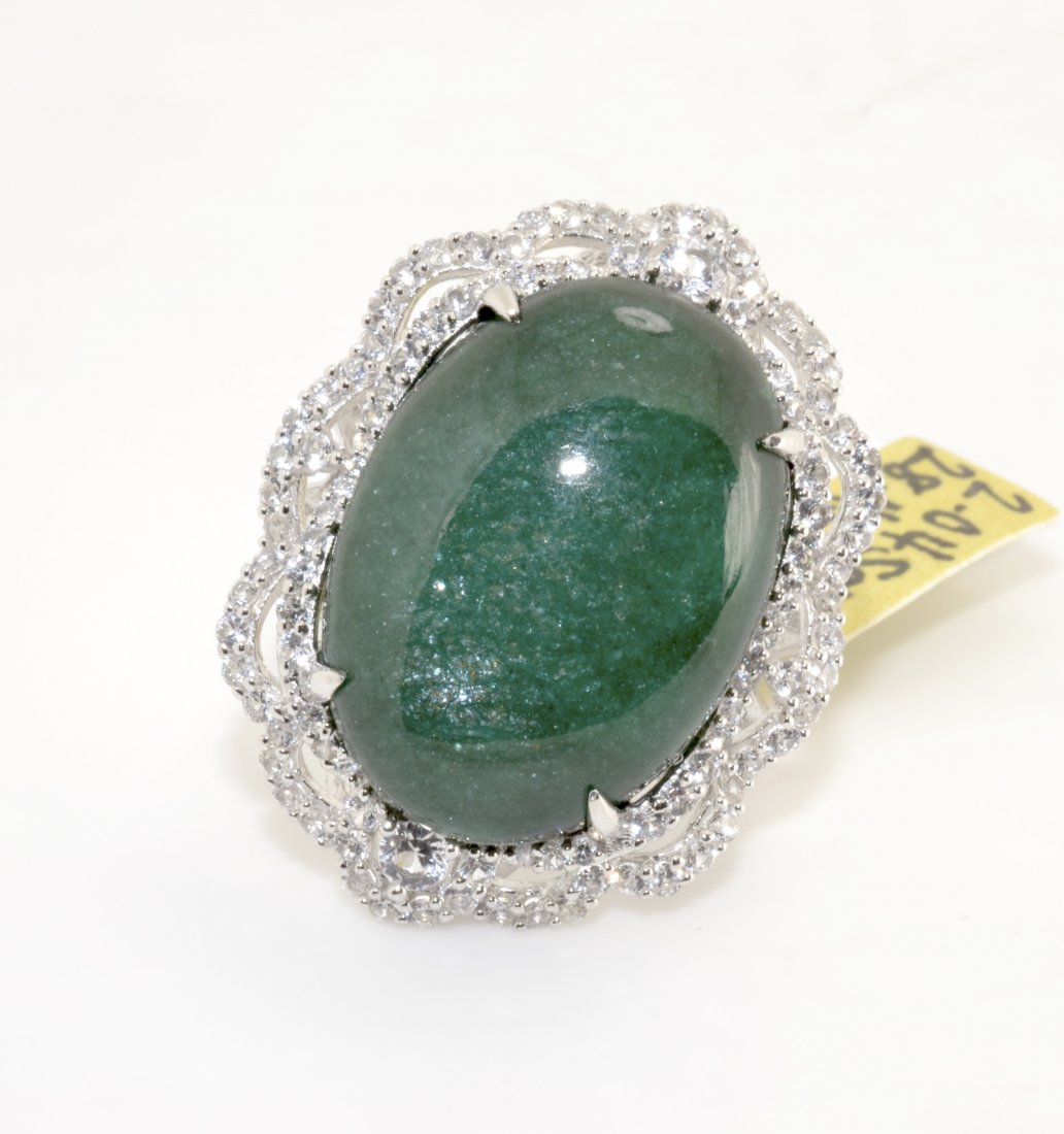 Enhanced Emerald & Sapphire Ring AV: $9,187: Solid platinum plated over silver ring with a 28.45 ct enhanced emerald beryl center stone and 2.04 cts of genuine colorless sapphires K35J7