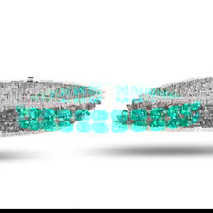 33.36ctw Emerald and 2.99ctw Diamond Platinum Bracelet: One polished, stamped, and tested platinum bracelet marked Oscar Friedman. The bracelet is mounted with: 56 genuine faceted emeralds weighing approximately 33.36 carats, and 592 genuine round diamonds