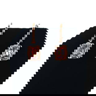 3.80ctw Morganite and 0.06ctw Diamond 14K Rose and White Gold Earrings: Fourteen karat (14K) two tone gold natural morganite beryl and diamond earrings. Two (2) cushion brilliant cut natural morganite beryl gemstones are mounted in the center of the earrings. Round brilli