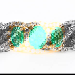 2.60ctw Emerald and 0.58ctw Diamond 14K Yellow Gold Ring: Name of Article: Lady's Emerald and Diamond Ring Setting: 14 Kt. Yellow Gold Mounting [4.10 gms] #Additional Stones/Information:# 41 Round Diamonds = Approx. 0.58 Cts. TWT (Color: G-H Clarity: VS-SI)