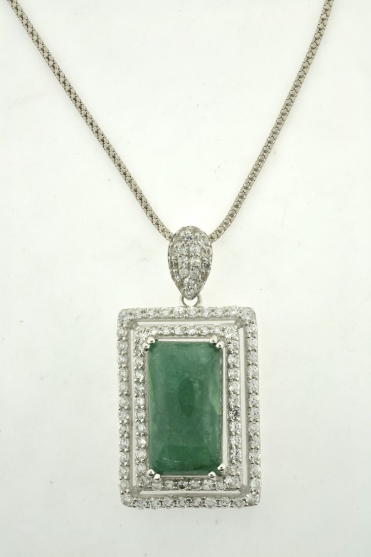 Emerald & Sapphire Necklace Appraised Value: $4,854: platinum plated silver necklace with 3.44 ct of colorless sapphires and 17.57 ct enhanced emerald/beryl (CENTER STONE) K43J9