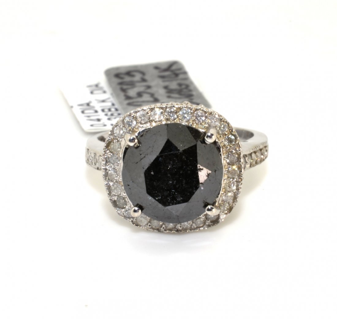 Black & White Diamond Ring AV: $8,440: 14K white gold black and white diamond ring with a 5.36 ct black diamond center stone and 0.44 cts of white diamonds I1-I2, H-J color K25J23