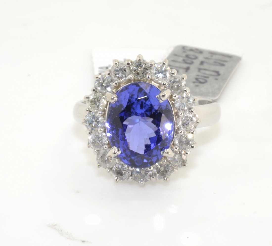 Tanzanite & Diamond Ring AV: $12,635: 14K white gold ring with a 3.99 ct tanzanite center stone and 1.12 cts of brilliant cut diamonds (I1-I2, G-I COLOR) K35J15