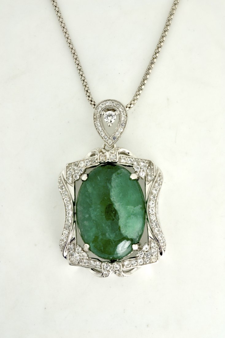 Enhanced Emerald Beryl & Sapphire Necklace AV: $8,622: Solid platinum plated over silver necklace with a 29.73 ct enhanced emerald beryl center stone and 1.86 cts of colorless sapphires K33J4