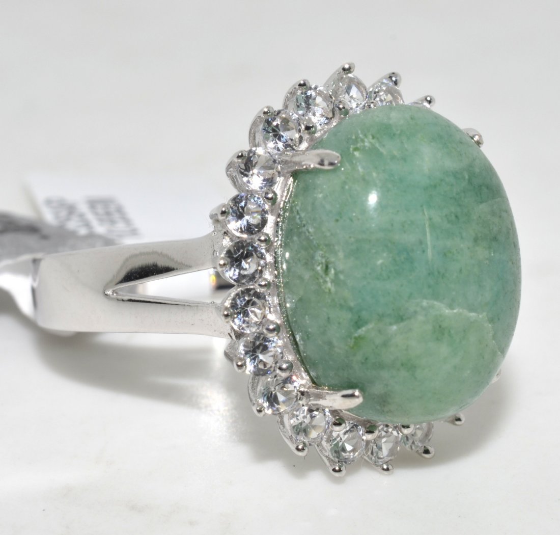 Emerald & Sapphire Ring Appraised Value: $2,255: Platinum plated over silver ring with 1.32 ct of colorless sapphires and 10.55 ct enhanced emerald/beryl center stone K14J5