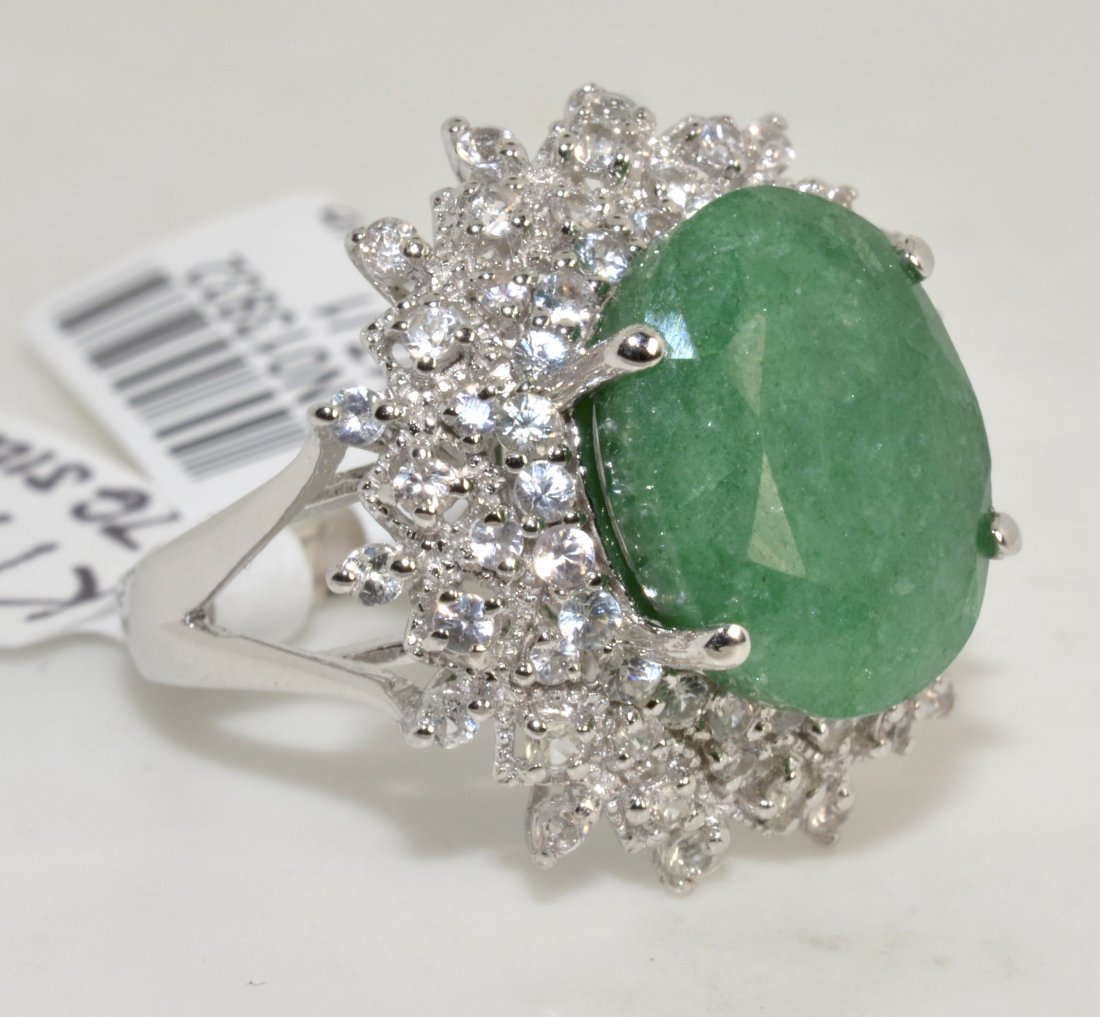 Emerald & Sapphire Ring Appraised Value: $5,055: Platinum plated over silver ring with 1.11 ct of colorless sapphires and 7.42 ct emerald/beryl center stone K17J1