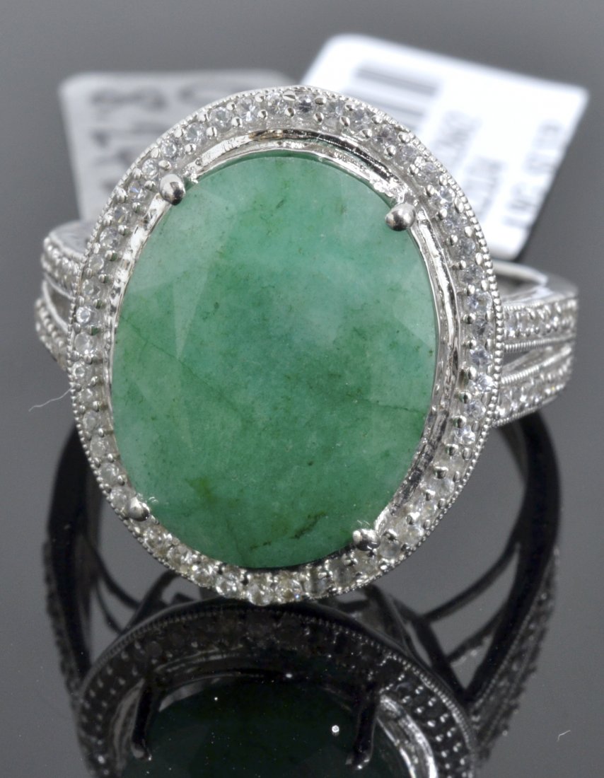 Emerald & Sapphire Ring Appraised Value: $2,920: 925 silver ladies cast emerald and white sapphire ring with 0.40 ct of white sapphires and a centered 8.24 ct oval cut natural beryl K21J4