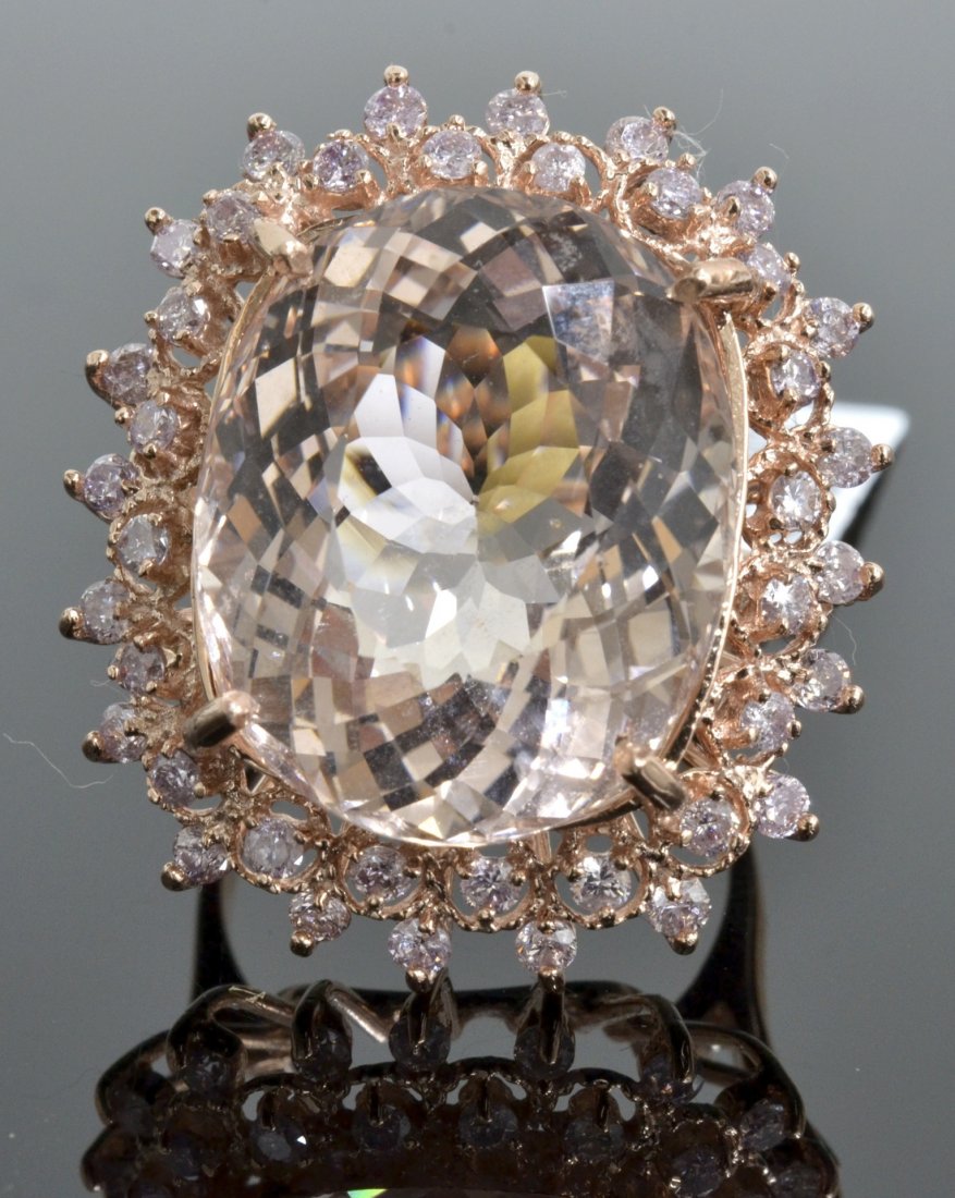 Morganite & Diamond Ring Appraised Value: $18,375: 14K rose gold ladies cast morganite and diamond ring with 1.00 ct round cut diamonds and a centered 18.86 ct rectangular cushion mixed cut natural morganite K49E95