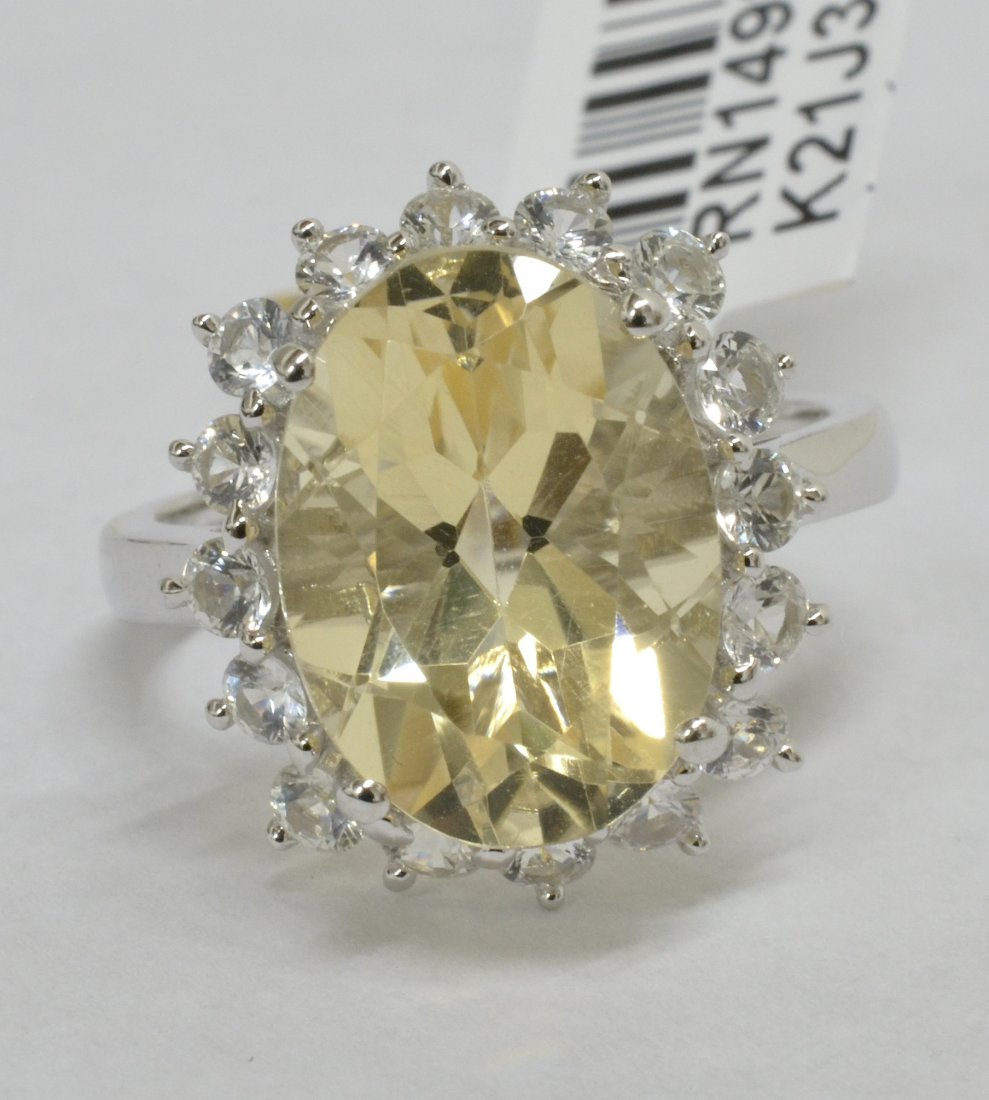 Citrine Quartz & Sapphire Ring AV: $3,190: Platinum plated/silver ring with 1.16 ct of colorless sapphires and 6.58 ct citrine quartz center stone K21J3