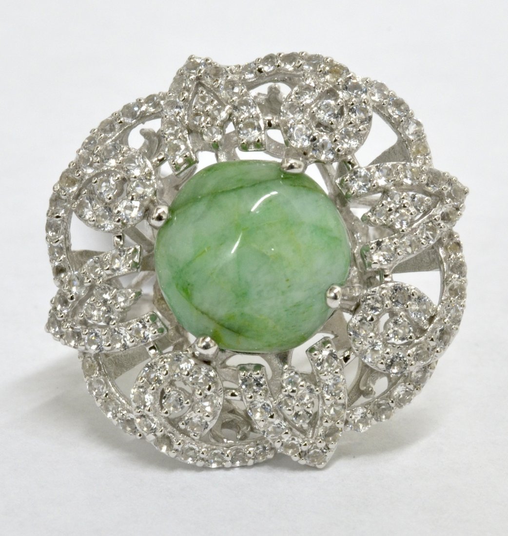 Beryl & Topaz Ring Appraised Value: $6,740: Platinum plated/silver ring with 1.96 ct of colorless topazs and 7.12 ct emerald/beryl center stone K33J7