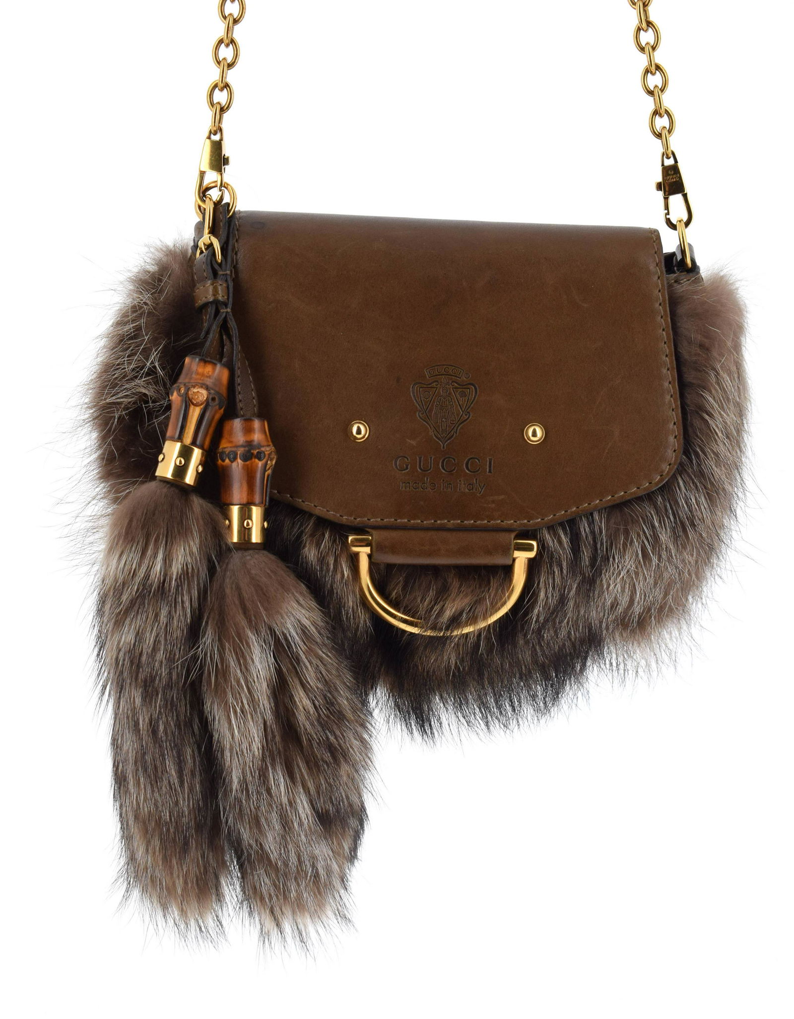 GUCCI par Tom FORD - 2000's "Collection Dragon": Sac en cuir brun et fourrure, garnitures métal doré, anses amovibles, pompons bambou Dim : 25 x 17 cm Bon état (petites marques d'usage)