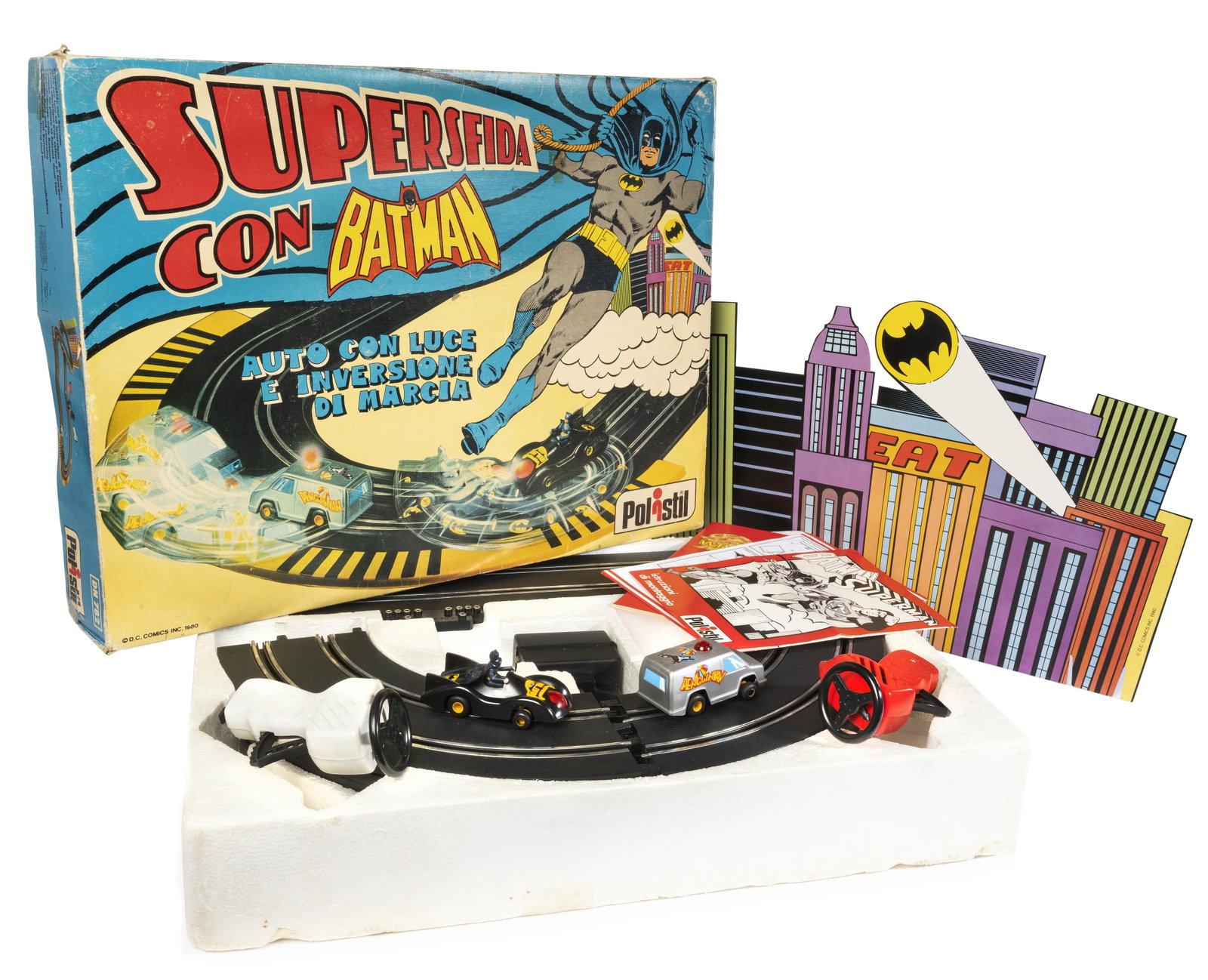 BATMAN: POLISTIL "Supersfida con Batman" 1980 Circuit automobile dans sa boite IT d'origine. (intÃ©rieur neuf, couvercle usÃ©e)