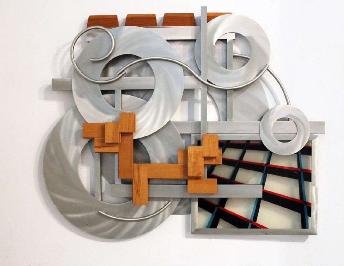 John Okulick (Born 1947): John Okulick (Born 1947) One to Another, 2007 Aluminum, wood and resin Signed, titled and dated in ink on verso with artist's studio label on verso 36 x 45 x 5 inches Condition: light surface scuffs
