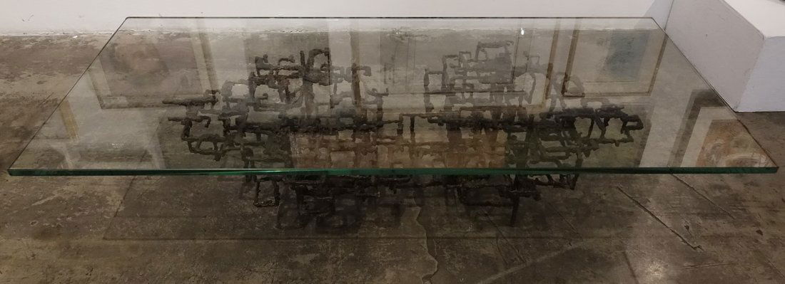 Daniel Gluck, Maze, c. 1969: Glass and steel; Glass top coffee table 29 3/4"x66" on 15 1/2" high sculpture Provenance: Artist Estate