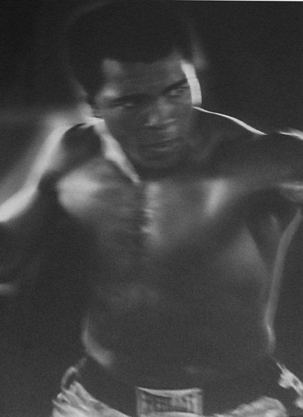 John Goodman, Muhammad Ali, 1976: Gelatin silver print Numbered 11/25 Signed, dated, numbered and titled in pencil on verso Image: 15.2 x 10.5 inches; Sheet: 20 x 16 inches; Framed: 25 x 21 inches