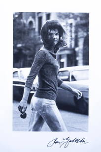 Ron Galella (Born 1931) "Windblown Jackie (Jackie Onassis on Madison Avenue, New York)," 1971: Silver gelatin print Signed in ink on recto Image: 12.125 x 8 inches; Framed: 14.75 x 10.75 inches