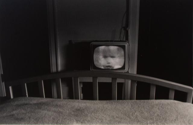 Lee Friedlander (1934) Galaxa (Baby on TV) , 1962: Gelatin Silver Print Signed on verso Provenance: Fraenkel Gallery - 1992 Image: 8 x 11 3/4 inches Framed: 16 3/8 x 20 1/2 inches