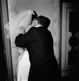 Diane Arbus (1923-1971): Groom Kissing His Bride, NYC, 1966