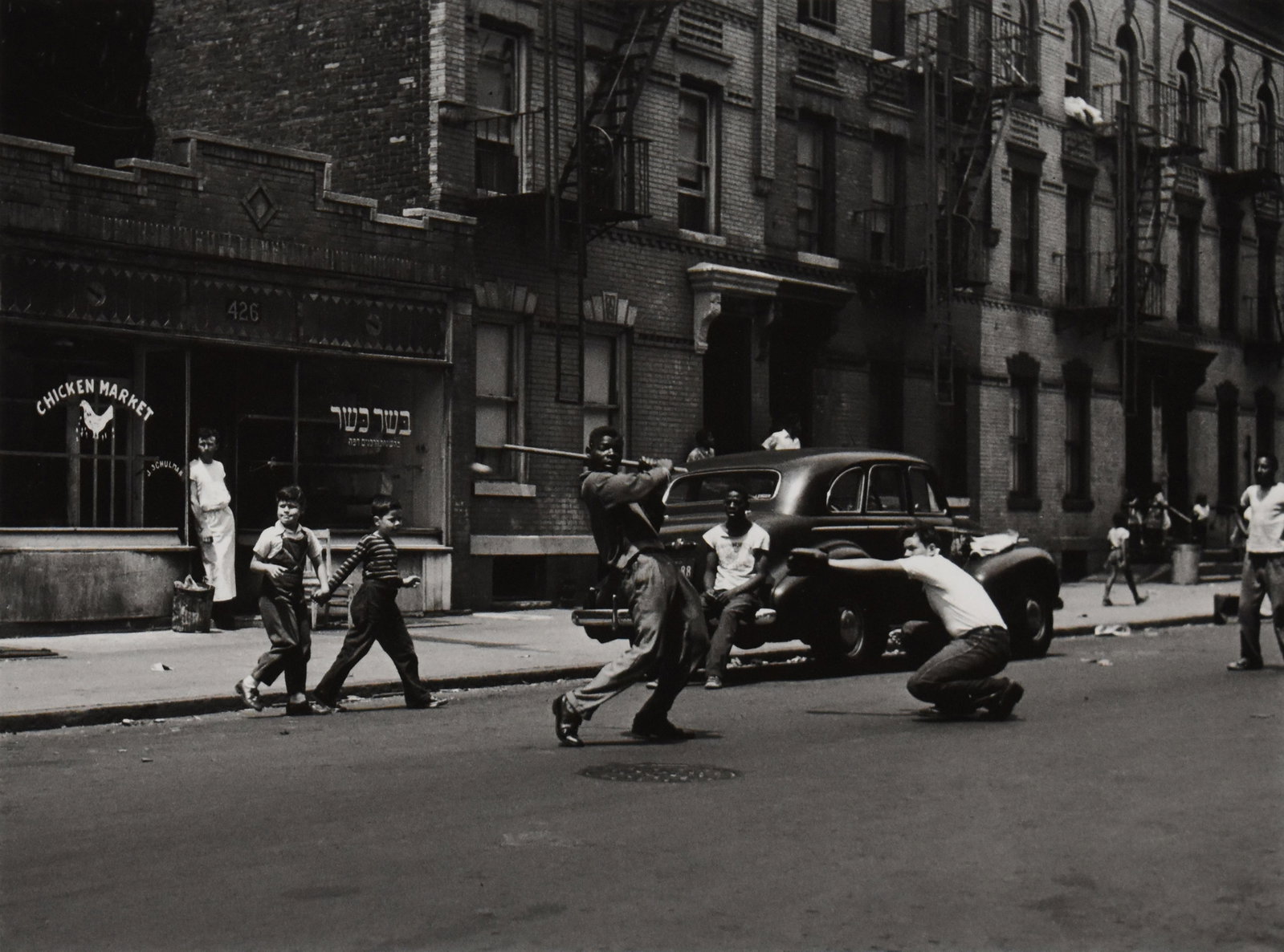 Arthur Leipzig (1918-2014): Stickball, New York City, 1950/Printed Later: Arthur Leipzig (1918-2014) Stickball, New York City, 1950/Printed Later Gelatin silver print Signed with photographer's stamp/reproduction stamp on verso Provenance: Peter Feterman Gallery, Santa Moni