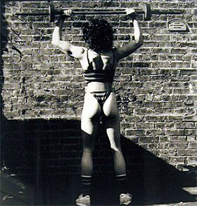 Robert Mapplethorpe: Lisa, Sheridan Squa: Robert Mapplethorpe: Lisa, Sheridan Square Gym, 1983, Silver gelatin print, Signed on verso by Lisa Lyons, Provenance: from the collection of Lisa Lyons, Image: 7 1/4 x 7 1/4 inches; Framed: 16 1/4 x