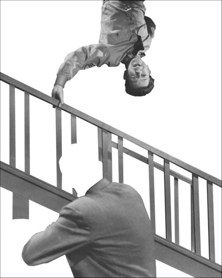 John Baldessari Stairway, Coat and Person, 2011/2012: Archival pigment print From the numbered edition of 120 Signed in ink with identification label on verso Produced for CCA Wattis, 2012 Image:19.5 x 15.5 inches; Framed: 27 x 23 inches