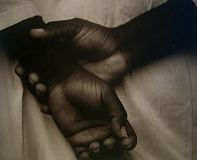 Jack Spencer Two Hands, Moon Lake, Mississippi: 1995 Toned gelatin silver print Artist Proof #1 Signed and editioned on recto; initialed, dated and captioned on verso IIIustrated in: Jack Spencer, Native Soil, LSU Press, 1999, frontispiece Image: 1
