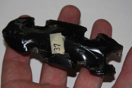 Obsidian Eccentric: Obsidian Eccentric 4.01" long 1.60" wide In the form of a human. Made from an obsidian Core, A very rare/scarce artifact. Mexico
