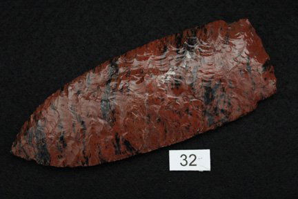 Parallel Flaked Mahogany Obsidian Blade: Made to look like a Scottsbluff Appers to possibly have been broken in half and glued back together. 5.61” long x 2.16” wide
